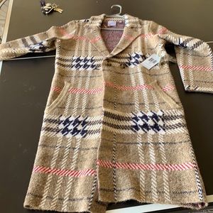 Women’s full length cardigan. Brand new